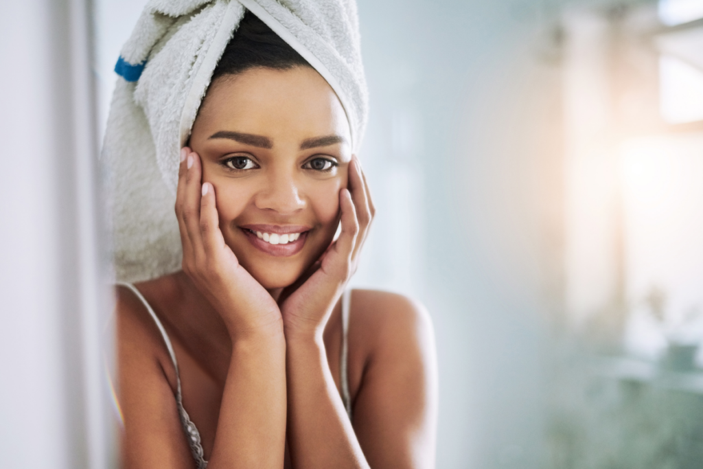 Summer skin care includes face washing and moisturizing