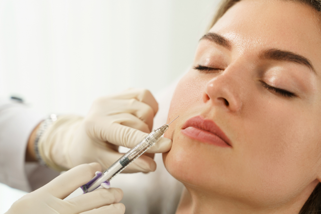 woman receiving lip filler