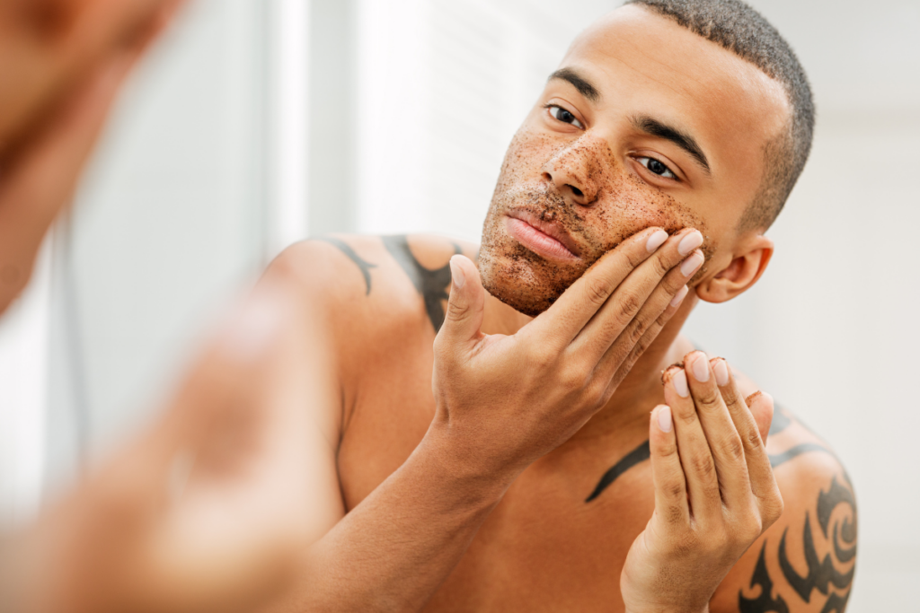 Man applying face scrub