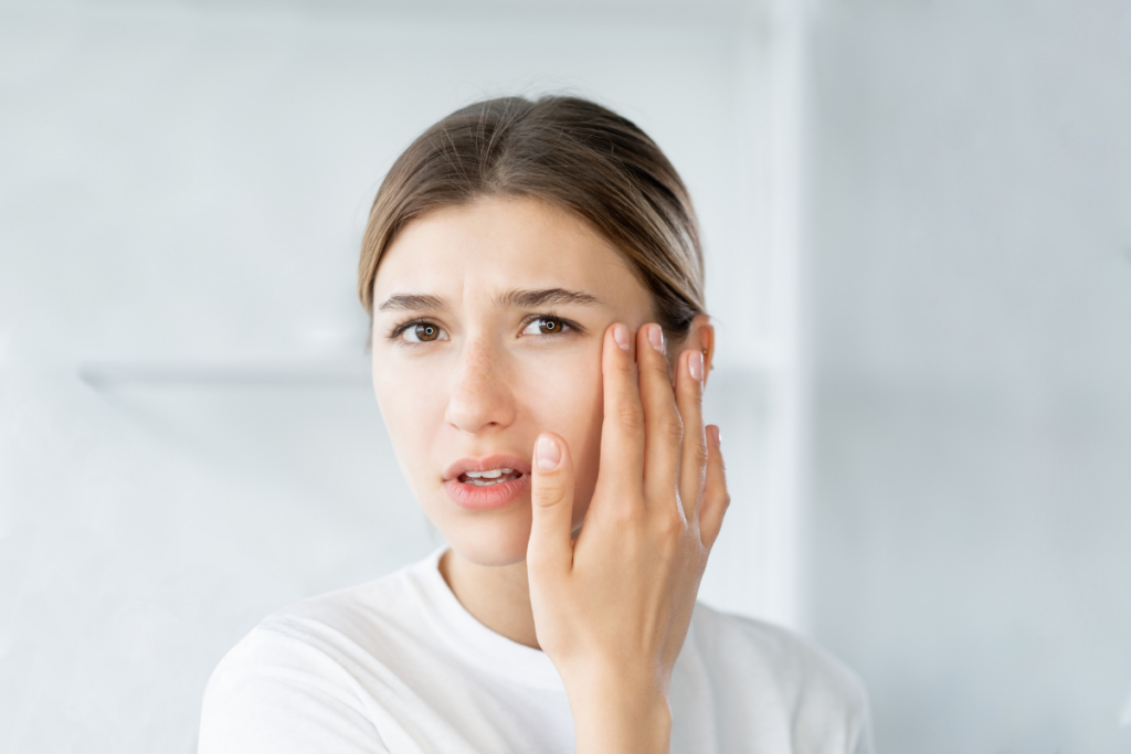 Young woman concerned about premature aging