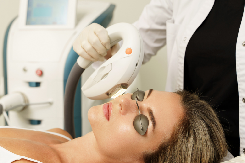 Woman receiving IPL Photofacial therapy