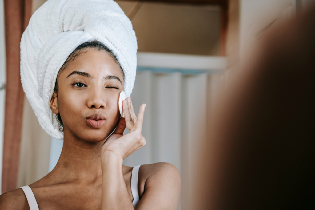 Young woman taking care of her skin
