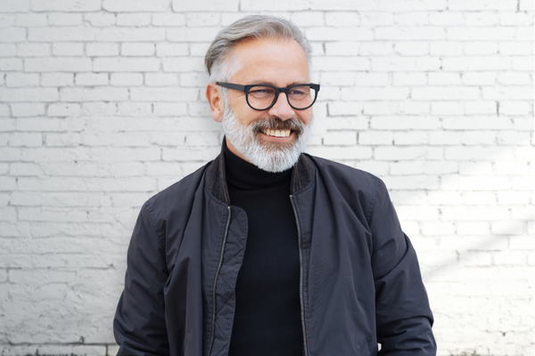 Handsome older man with smooth, youthful skin